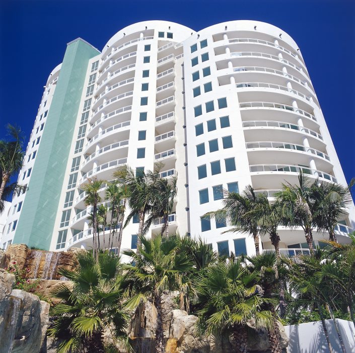 View of facade from water feature